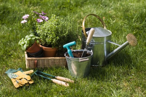 Gardener assessing a garden site with clipboard